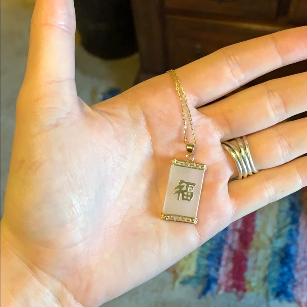 14kt gold necklace with Japanese charm